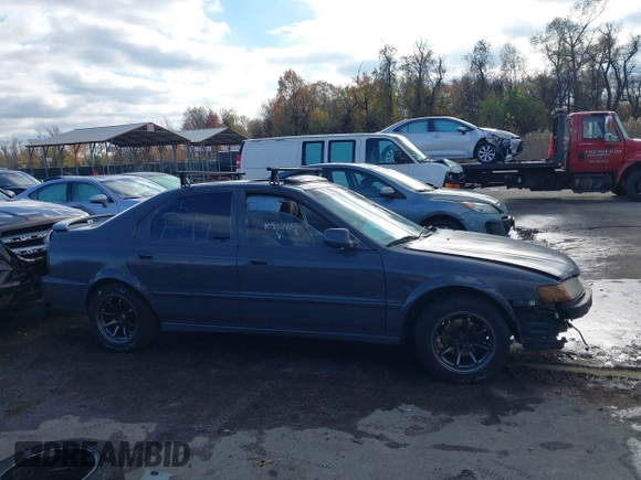 1997 Honda Accord EX with VIN 1HGCD565XVA049579, listed as a IAAI auction lot 40867933 with 189,191 mi miles and . Bid and sale history available at DreamBid. Image 14.