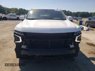 2021 Chevrolet Tahoe LT with VIN 1GNSCNKD4MR252131, listed as a Copart auction lot 69876114 with 99,192 mi miles and Salvage title. Bid and sale history available at DreamBid. Image 5.