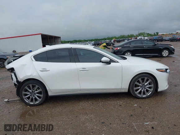 2023 Mazda 3 S Premium with VIN 3MZBPBDM6PM371326, listed as a IAAI auction lot 42138373 with 24,865 mi miles and . Bid and sale history available at DreamBid. Image 13.