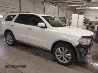 2013 Dodge Durango Crew with VIN 1C4SDJDT1DC540680, listed as a IAAI auction lot 41649262 with 106,016 mi miles. Bid and sale history available at carsss.com. Image 1.