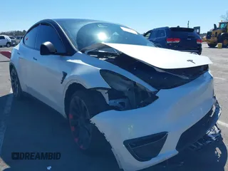 2023 Tesla Model Y Performance z VIN 7SAYGDEF2PF775367, wystawiony jako IAAI lot #41848418 z przebiegiem 19 636 mil mil oraz . Historia ofert i sprzedaży dostępna na DreamBid. Obrazek 1.