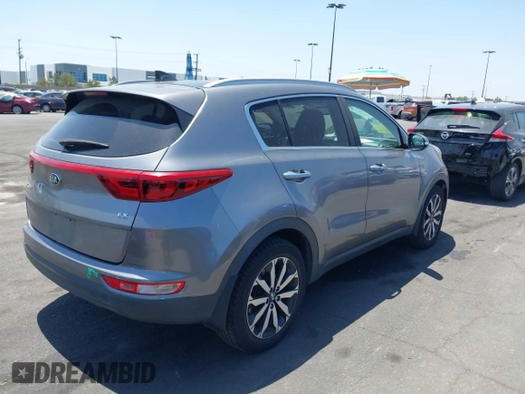2017 Kia Sportage EX with VIN KNDPN3AC8H7186240, listed as a IAAI auction lot 42283574 with 100,153 mi miles and . Bid and sale history available at DreamBid. Image 4.