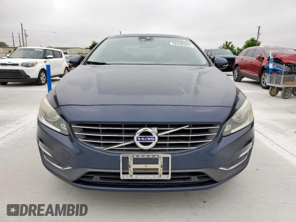 2014 Volvo S60 T5 z VIN YV1612FS2E2296432, wystawiony jako Copart lot #58530265 z przebiegiem 85 580 mil mil oraz Czysty tytuł • Clean title. Historia ofert i sprzedaży dostępna na DreamBid. Obrazek 5.