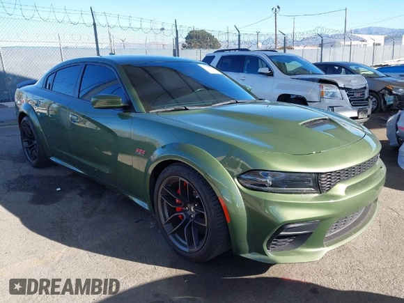 2022 Dodge Charger Scat Pack Widebody with VIN 2C3CDXGJ1NH216763, listed as a IAAI auction lot 41259159 with 32,610 mi miles and . Bid and sale history available at DreamBid. Image 1.