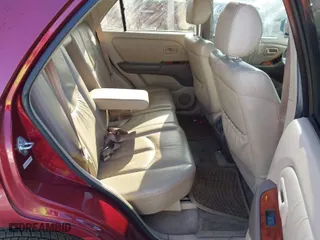 1999 Lexus RX 300 Luxury SUV with VIN JT6HF10U2X0089730, listed as a IAAI auction lot 41982648 with 150,322 mi miles. Bid and sale history available at carsss.com. Image 8.
