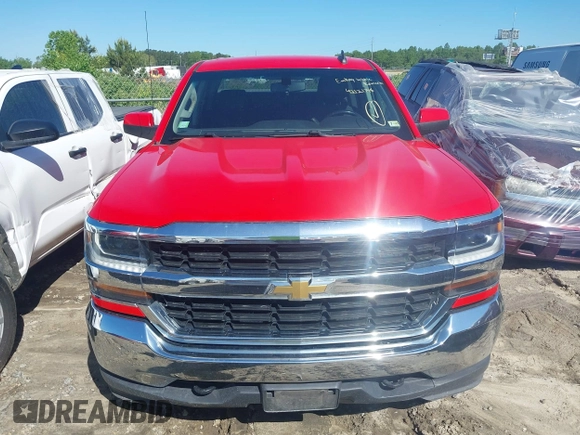 2018 Chevrolet Silverado 1500 LT with VIN 1GCUKREC0JF222376, listed as a IAAI auction lot 42121748 with 143,472 mi miles and . Bid and sale history available at DreamBid. Image 12.