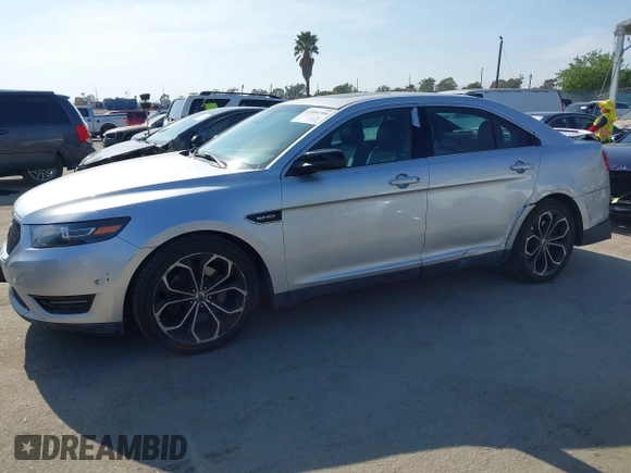 2014 Ford Taurus SHO with VIN 1FAHP2KT8EG123342, listed as a IAAI auction lot 42095390 with 142,957 mi miles. Bid and sale history available at carsss.com. Image 14.