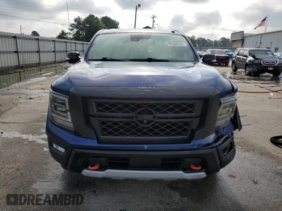 2020 Nissan Titan SL с VIN 1N6AA1ED2LN505013, выставлен на аукционе Copart как лот 56933185 с пробегом 91 342 миль миль и Списание • Salvage title. История ставок и продаж доступна на DreamBid. Изображение 5.