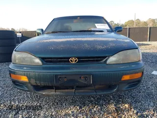 1996 Toyota Camry DX with VIN JT2BG12K2T0416797, listed as a IAAI auction lot 41789017 with 312,858 mi miles. Bid and sale history available at carsss.com. Image 6.
