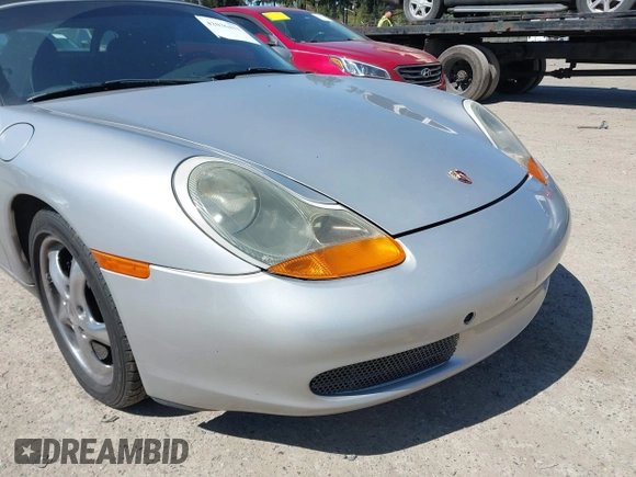 1998 Porsche Boxster с VIN WP0CA2983WU624195, выставлен на аукционе IAAI как лот 42036411 с пробегом 159 202 миль миль и . История ставок и продаж доступна на DreamBid. Изображение 6.