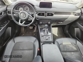 2018 Mazda CX-5 Touring z VIN JM3KFBCM4J0349687, wystawiony jako Copart lot #55857945 z przebiegiem Nie podano mil oraz Szkoda całkowita • Salvage title. Historia ofert i sprzedaży dostępna na DreamBid. Obrazek 8.