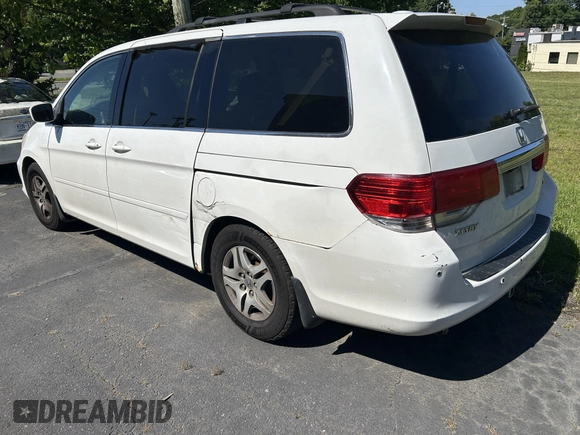 2009 Honda Odyssey Touring with VIN 5FNRL38819B025126, listed as a IAAI auction lot 42219263 with 187,191 mi miles and . Bid and sale history available at carsss.com. Image 3.