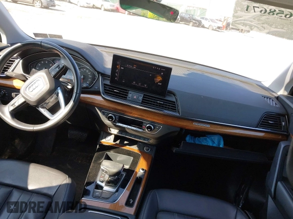 2021 Audi Q5 Premium with VIN WA1AAAFY7M2133167, listed as a IAAI auction lot 42658671 with 62,020 mi miles and . Bid and sale history available at DreamBid. Image 5.