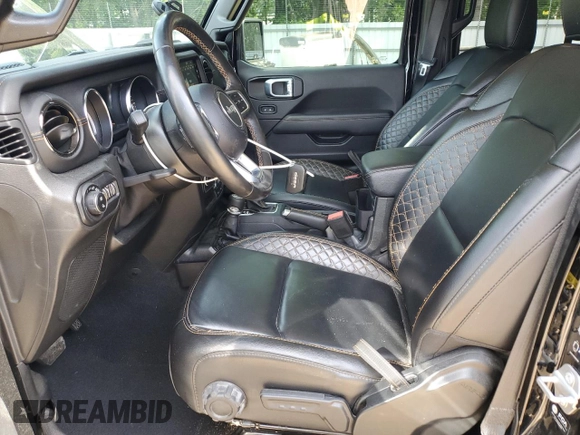 2021 Jeep Gladiator High Altitude with VIN 1C6HJTFGXML570864, listed as a Copart auction lot 56964975 with 67,538 mi miles and Salvage title. Bid and sale history available at DreamBid. Image 7.