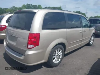 2014 Dodge Grand Caravan SXT z VIN 2C4RDGCG6ER162533, wystawiony jako IAAI lot #42251591 z przebiegiem 70 666 mil mil oraz . Historia ofert i sprzedaży dostępna na DreamBid. Obrazek 4.