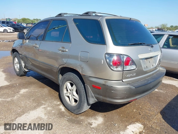 2001 Lexus RX 300 with VIN JTJGF10U410088393, listed as a IAAI auction lot 41864872 with 212,728 mi miles and . Bid and sale history available at DreamBid. Image 3.