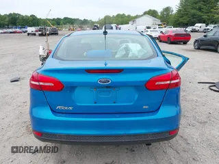2015 Ford Focus SE z VIN 1FADP3F26FL252212, wystawiony jako IAAI lot #42345763 z przebiegiem 102 549 mil mil oraz . Historia ofert i sprzedaży dostępna na DreamBid. Obrazek 16.