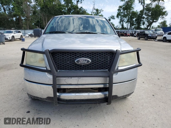 2006 Ford F-150 XLT with VIN 1FTRW12W06KD84579, listed as a Copart auction lot 55090155 with 296,917 mi miles and Salvage Title. Bid and sale history available at DreamBid. Image 5.