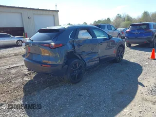 2023 Mazda CX-30 2.5 S Carbon Edition with VIN 3MVDMBCM5PM528946, listed as a IAAI auction lot 41882936 with 62,815 mi miles. Bid and sale history available at carsss.com. Image 4.