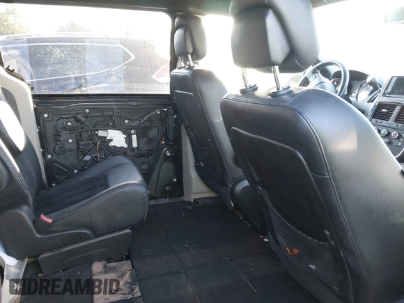 2018 Dodge Grand Caravan SXT with VIN 2C4RDGCG2JR266074, listed as a IAAI auction lot 40545630 with 98,036 mi miles and . Bid and sale history available at DreamBid. Image 8.