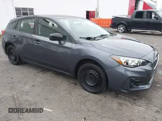 2017 Subaru Impreza with VIN 4S3GTAA61H3748829, listed as a IAAI auction lot 41310157 with 44,395 mi miles. Bid and sale history available at carsss.com. Image 1.