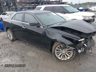 2015 Cadillac CTS Luxury RWD with VIN 1G6AR5SX4F0103211, listed as a IAAI auction lot 42416746 with 128,553 mi miles and . Bid and sale history available at DreamBid. Image 1.