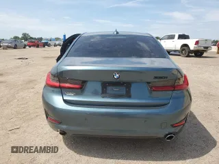 2020 BMW 3 Series 330i z VIN 3MW5R1J02L8B33169, wystawiony jako Copart lot #55660155 z przebiegiem 53 585 mil mil oraz Nie do naprawy • Non repairable. Historia ofert i sprzedaży dostępna na DreamBid. Obrazek 6.