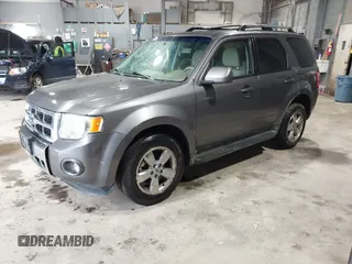 2012 Ford Escape Limited with VIN 1FMCU9EGXCKA96624, listed as a IAAI auction lot 42205141 with 163,223 mi miles. Bid and sale history available at carsss.com. Image 2.