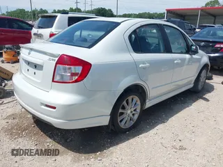 2008 Suzuki SX4 Touring 2 z VIN JS2YC417285100960, wystawiony jako IAAI lot #42166346 z przebiegiem 162 498 mil mil oraz . Historia ofert i sprzedaży dostępna na DreamBid. Obrazek 4.