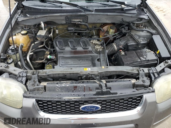 2003 Ford Escape Limited with VIN 1FMCU941X3KD47977, listed as a Copart auction lot 85054974 with 303,773 mi miles and Salvage Title. Bid and sale history available at carsss.com. Image 12.