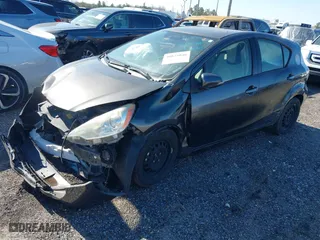 2014 Toyota Prius c One with VIN JTDKDTB32E1084457, listed as a IAAI auction lot 40825046 with 1 mi miles. Bid and sale history available at carsss.com. Image 15.