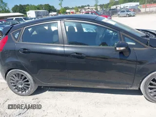 2013 Ford Fiesta SE with VIN 3FADP4EJ3DM218898, listed as a IAAI auction lot 42038436 with 177,193 mi miles and . Bid and sale history available at DreamBid. Image 13.