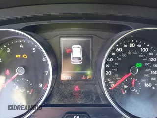 2021 Volkswagen Tiguan SE z VIN 3VV3B7AX0MM080853, wystawiony jako IAAI lot #42406539 z przebiegiem 73 295 mil mil oraz . Historia ofert i sprzedaży dostępna na DreamBid. Obrazek 7.