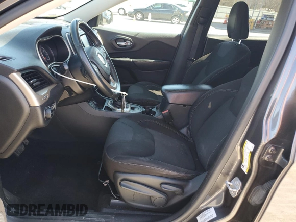 2015 Jeep Cherokee Latitude with VIN 1C4PJLCS0FW707387, listed as a Copart auction lot 48953465 with 140,965 mi miles and Salvage Title. Bid and sale history available at carsss.com. Image 7.