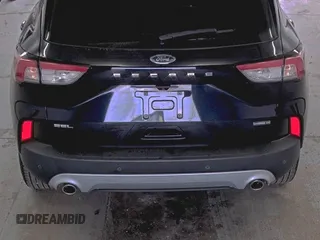 2021 Ford Escape SEL Hybrid with VIN 1FMCU9CZ0MUB25820, listed as a IAAI auction lot 42730204 with 66,443 mi miles and . Bid and sale history available at DreamBid. Image 10.