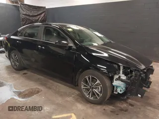 2024 Kia Forte LXS with VIN 3KPF24AD6RE745031, listed as a IAAI auction lot 41776118 with 18,093 mi miles and . Bid and sale history available at DreamBid. Image 1.