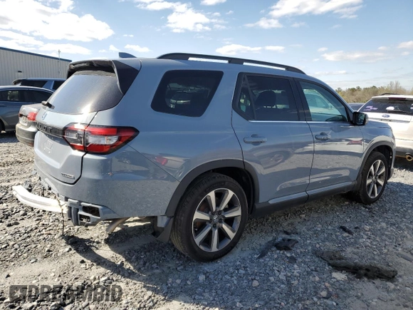 2024 Honda Pilot Touring with VIN 5FNYG2H79RB004803, listed as a Copart auction lot 49702415 with 27,406 mi miles and Salvage title. Bid and sale history available at DreamBid. Image 3.