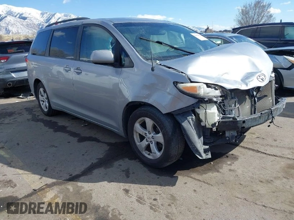 2012 Toyota Sienna LE AAS with VIN 5TDKK3DC1CS264239, listed as a IAAI auction lot 41839022 with 221,769 mi miles. Bid and sale history available at carsss.com. Image 1.