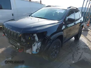 2022 Jeep Cherokee Trailhawk with VIN 1C4PJMBX1ND533715, listed as a IAAI auction lot 42041057 with 65,487 mi miles and . Bid and sale history available at DreamBid. Image 18.