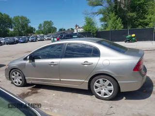 2006 Honda Civic LX z VIN 1HGFA16586L083119, wystawiony jako IAAI lot #42237313 z przebiegiem Nie podano mil oraz . Historia ofert i sprzedaży dostępna na DreamBid. Obrazek 15.