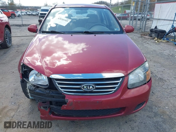 2009 Kia Spectra EX with VIN KNAFE221495665378, listed as a IAAI auction lot 42036945 with 153,254 mi miles. Bid and sale history available at carsss.com. Image 6.