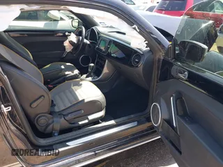 2018 Volkswagen Beetle Dune with VIN 3VWSD7AT1JM702354, listed as a IAAI auction lot 41993527 with 50,952 mi miles and . Bid and sale history available at DreamBid. Image 5.