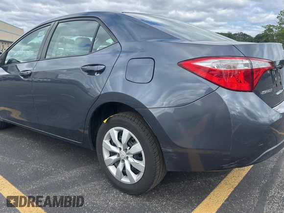 2014 Toyota Corolla L z VIN 2T1BURHE6EC077048, wystawiony jako Copart lot #62062695 z przebiegiem 199 669 mil mil oraz Czysty tytuł • Clean title. Historia ofert i sprzedaży dostępna na DreamBid. Obrazek 3.