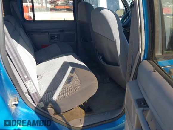 1994 Ford Explorer Eddie Bauer z VIN 1FMDU34X8RUE55730, wystawiony jako IAAI lot #41852462 z przebiegiem 209 459 mil mil oraz . Historia ofert i sprzedaży dostępna na DreamBid. Obrazek 8.