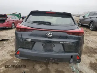2025 Lexus UX with VIN JTHUCJDH5S2003058, listed as a Copart auction lot 43457505 with 1,239 mi miles and Salvage Title. Bid and sale history available at carsss.com. Image 6.