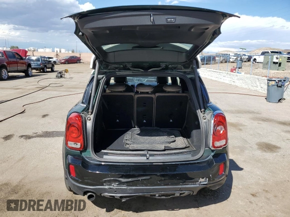 2019 MINI Countryman Cooper S with VIN WMZYT5C58K3E69954, listed as a Copart auction lot 71786544 with 59,971 mi miles and Salvage Title. Bid and sale history available at carsss.com. Image 6.