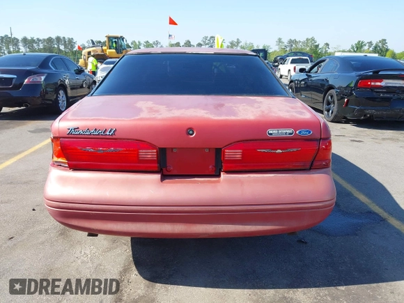 1996 Ford Thunderbird LX z VIN 1FALP62W0TH142986, wystawiony jako IAAI lot #42030900 z przebiegiem 168 993 mil mil oraz . Historia ofert i sprzedaży dostępna na DreamBid. Obrazek 16.