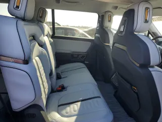 2023 Rivian R1S Adventure with VIN 7PDSGABA0PN005768, listed as a Copart auction lot 73223724 with 212 mi miles and Salvage Title. Bid and sale history available at carsss.com. Image 11.