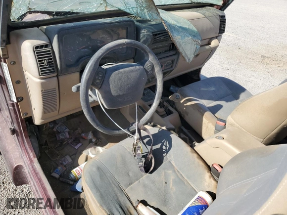 2002 Jeep Wrangler Sahara with VIN 1J4FA59S72P706380, listed as a Copart auction lot 56365355 with 282,467 mi miles and Clean title. Bid and sale history available at DreamBid. Image 8.