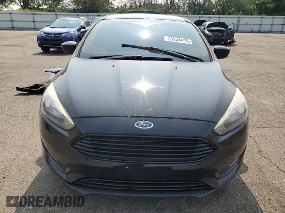 2018 Ford Focus SE z VIN 1FADP3F2XJL228407, wystawiony jako Copart lot #59254415 z przebiegiem 75 241 mil mil oraz Szkoda całkowita • Salvage title. Historia ofert i sprzedaży dostępna na DreamBid. Obrazek 5.